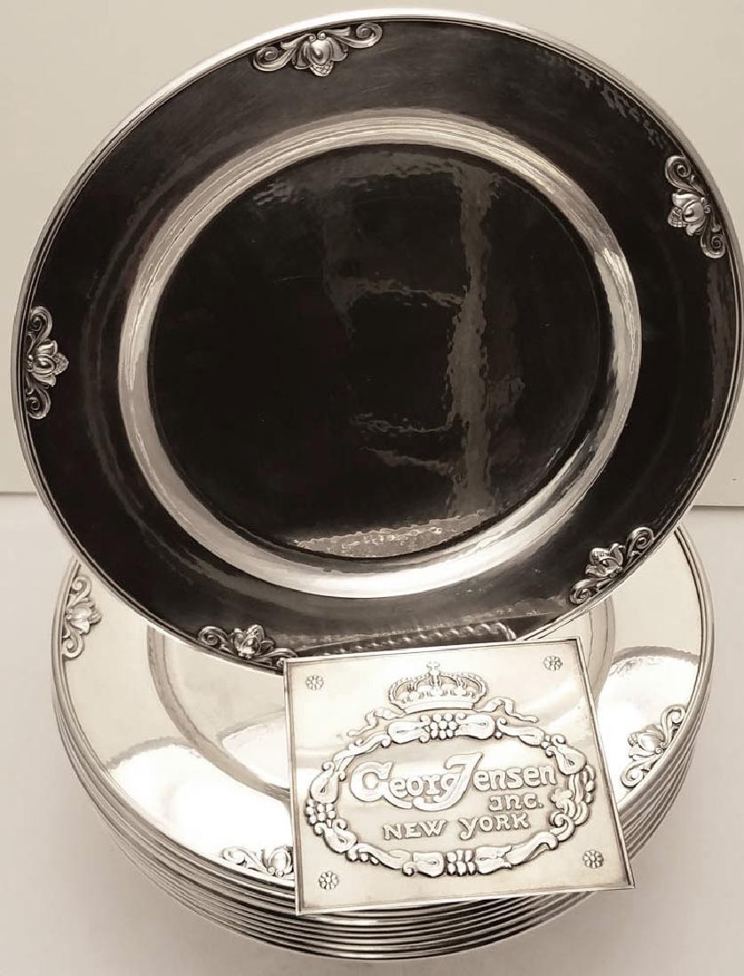 Set of (12) Georg Jensen Sterling "Acorn" Dinner Plates: Set of (12) Georg Jensen sterling silver "Acorn" pattern dinner plates, no. 642A, Georg Jensen & Wendel, Copenhagen, circa 1940s. "Acorn" pattern designed by Johan Rohde circa 1931, plain circular, th