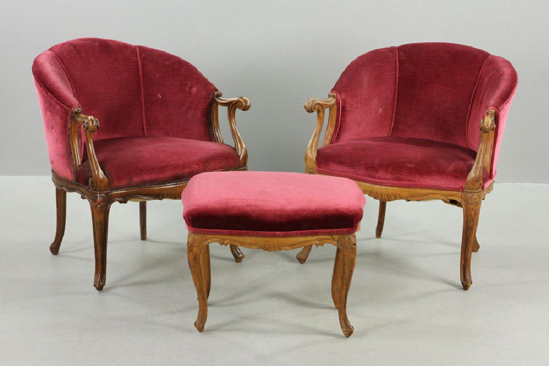 French Velvet Chairs and Footstool: French armchairs and footstool set, upholstered in red velvet.