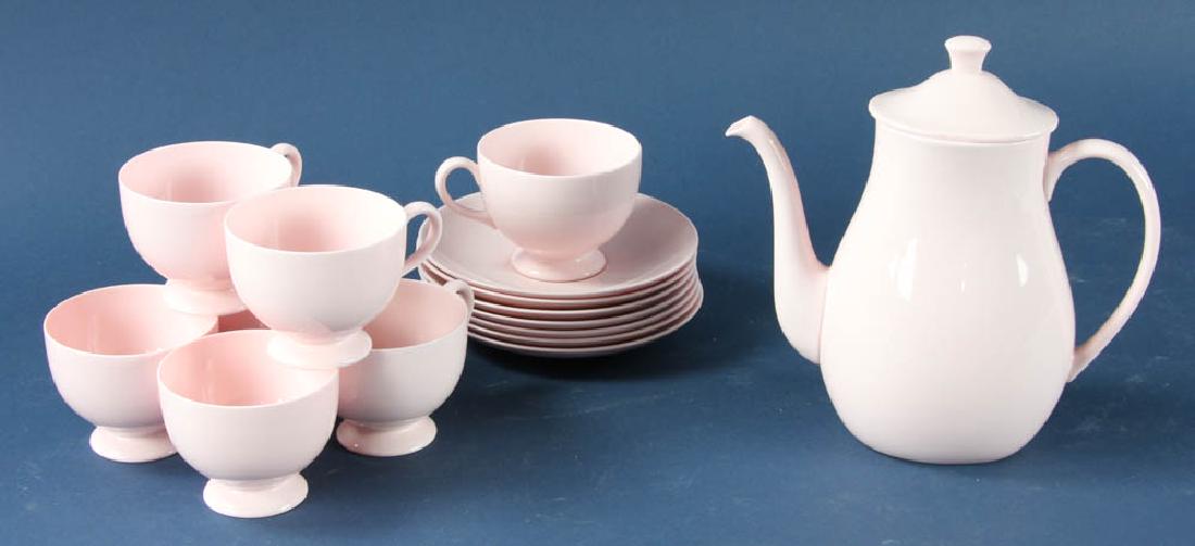 Wedgwood Pink Bone China Tea Set: Wedgwood pink bone china tea set, including 8" teapot and seven cups with saucers, (15) pieces total. Provenance: Studio Props of Martha Stewart.