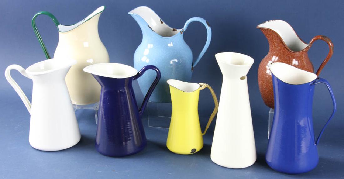 Group of Enameled Pitchers: Group of eight enameled pitchers. Provenance: Studio Props of Martha Stewart.