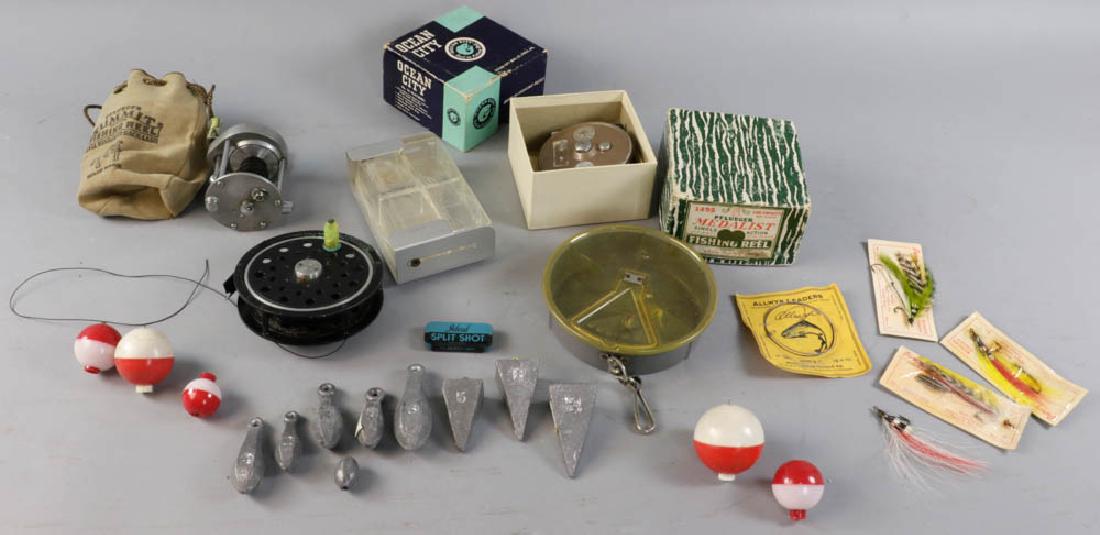 Fishing Items, Reels, Weights: Group of fishing items to include Pflueger reels, weights, etc. Provenance: Studio Props of Martha Stewart.