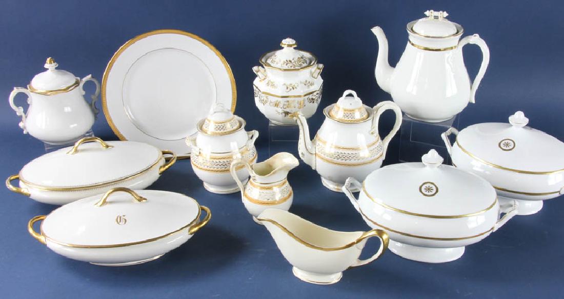 English and French Gilt Decorated Porcelains: English and French gilt-decorated porcelain pieces to include Limoges Bernardaud, etc., (19) pieces total. Provenance: Studio Props of Martha Stewart.