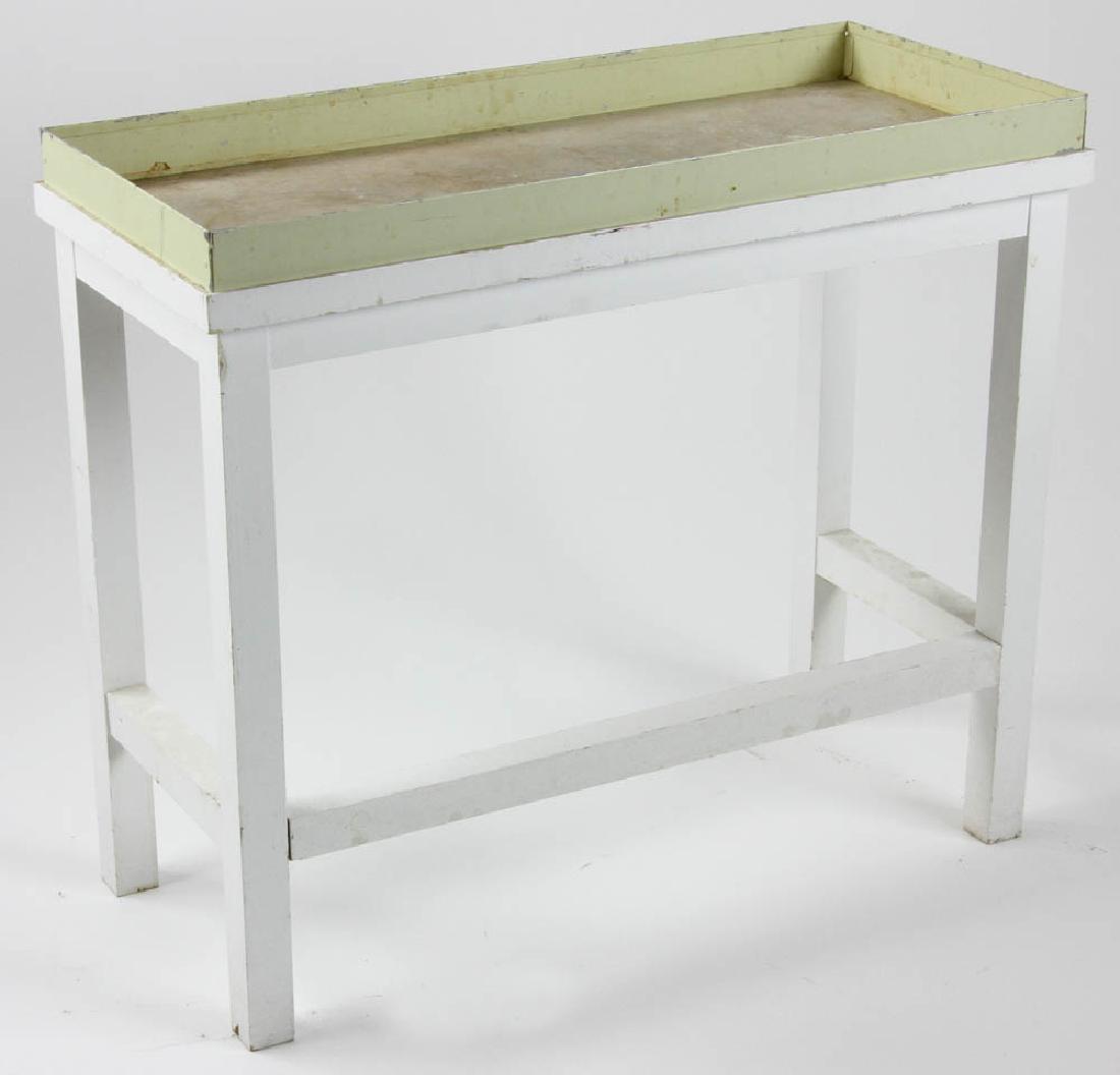 Wooden Plant Stand: Wooden plant stand with removable metal tray, 26 1/2" H x 30 1/2" W x 13 1/2" D. Provenance: Studio Props of Martha Stewart.