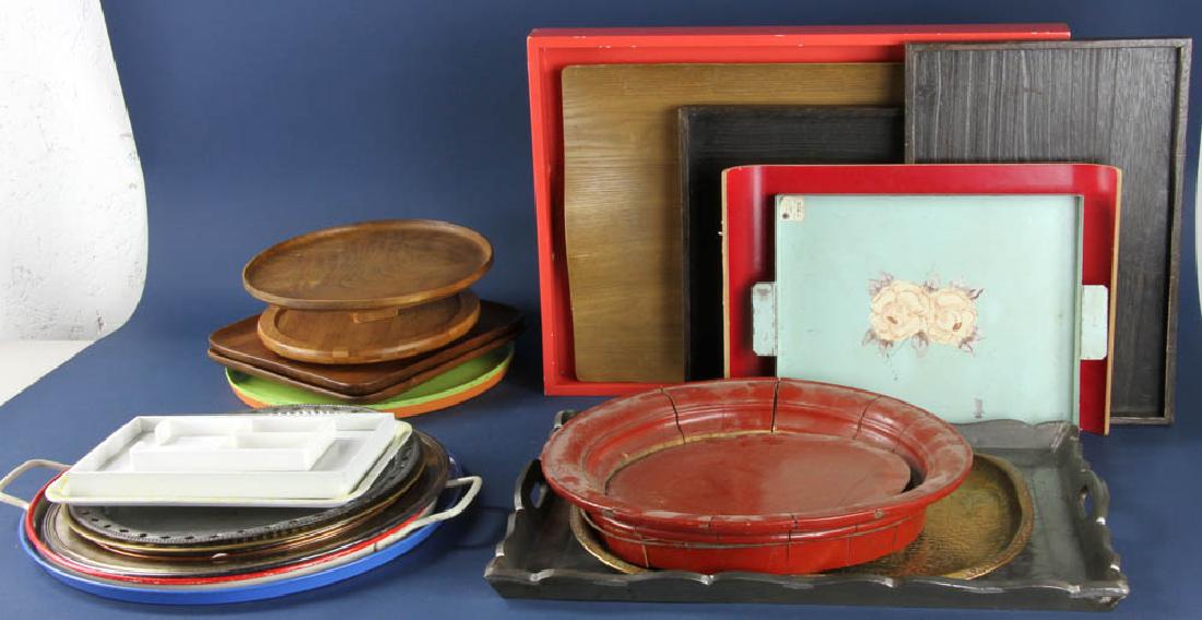 Assortment of Trays: Assortment of trays, various materials and sizes, 43 pieces in total, largest tray measures 22 x 16" D. Provenance: Studio Props of Martha Stewart.