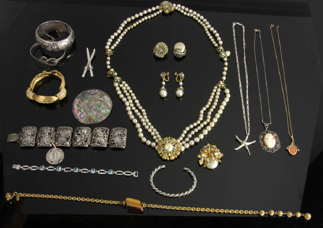 Collection of Vintage Costume Jewelry: Vintage costume jewelry grouping to include pieces by Miriam Haskell, Hariett Carnegie, cameo brooch and some sterling. Provenance: Marblehead, Massachusetts estate.