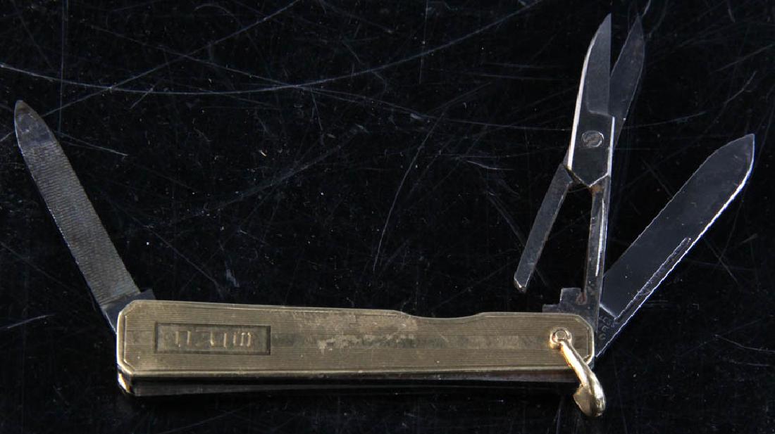 Cartier 14k Yellow Gold Penknife: Cartier 14k yellow gold penknife, scissors and nail file combination, 2 3/4" L (closed), approximately 26 grams TW. Provenance: Broomfield, Colorado estate.