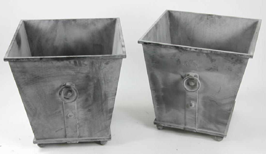 Pair of Georgian Style Metal Urns: Pair of Georgian-style lead color metal urns with ring bails, 19 1/2" H x 19 1/2" W x 19 1/2" D. Provenance: Beverly, Massachusetts estate.