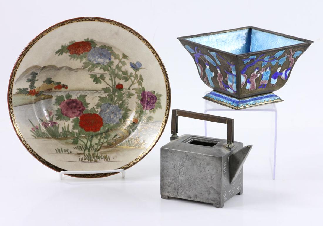 Group of Three Asian Decorative Objects: Group of three Asian decorative items, to include; Satsuma ware bowl with floral decoration and distant river view, gilt patterned rim, 2" high x 9" diameter; square bowl, enameled metal, decorated wi