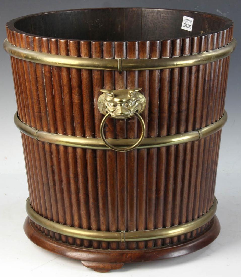 Mahogany and Brass Wine Cooler: Mahogany and brass wine cooler with lion head handles, 16" H x 16" diameter. Provenance: Salem, Massachusetts estate.