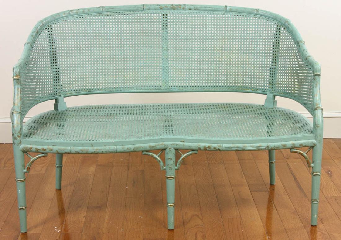 Rattad and Faux Bamboo Loveseat: Rattan and faux bamboo loveseat, 33" H x 48" W x 22" D. Provenance: West Palm Beach, Florida estate.