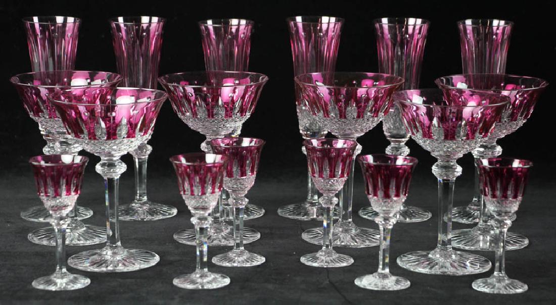 Cut Cranberry Glass Stemware: Cut cranberry glass stemware to include: six (6) wine glasses, 6" H; six (6) cordials, 4" H; six (6) champagne flutes, 7 1/2" H, eighteen (18) glasses in total. Provenance: Collection of a Manhattan a