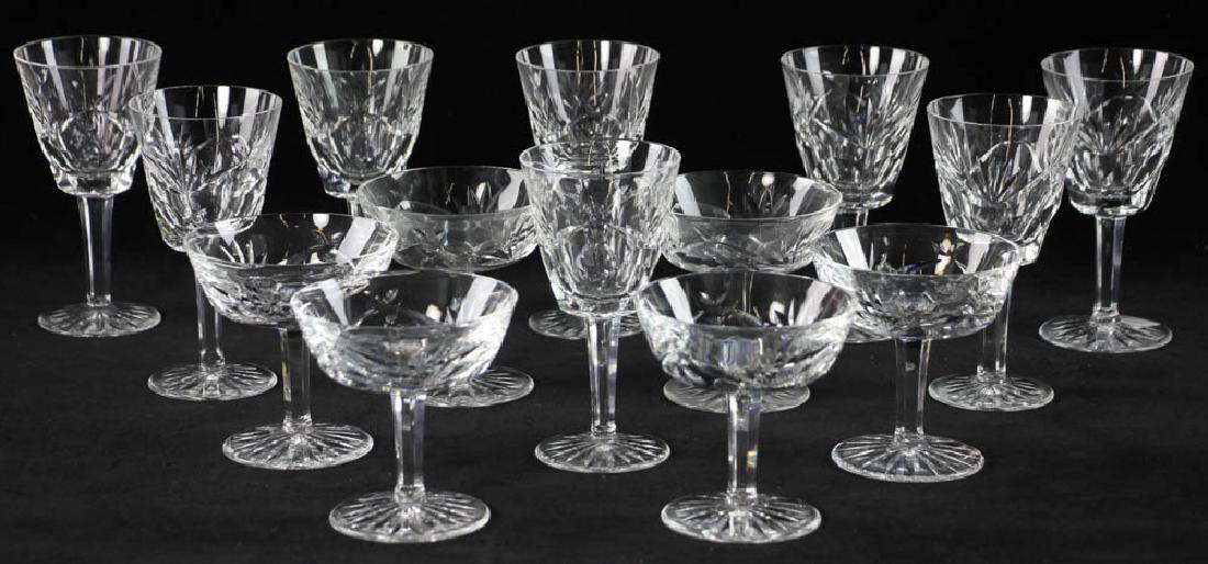 Waterford Crystal Wine Glasses and Sherbets: Waterford crystal to include set of eight (8) wine glasses, 6" H together with set of six (6) sherbets, 4" H. Provenance: Collection of a Manhattan and Palm Beach socialite.