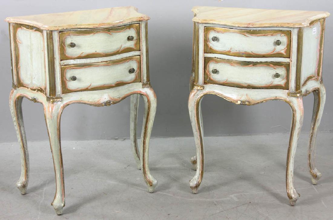 Pair of French Rococo Style Two Drawer Chests: Pair of French rococo-style two-drawer chests with faux marble tops, circa 1900, 31 1/2" H x 24" W x 13" D. Provenance: New York estate.