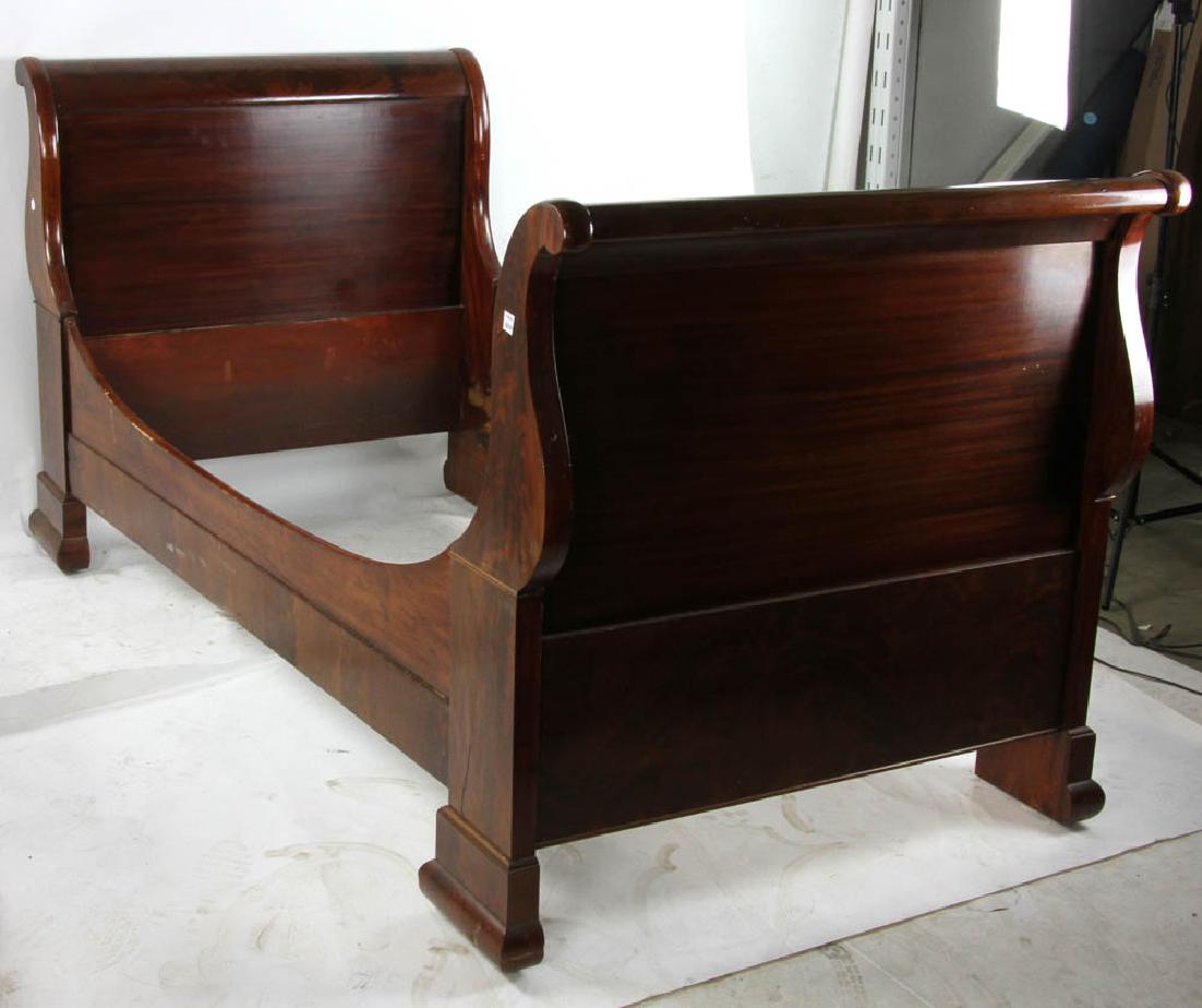 19thC Flame Mahogany Sleigh Bed: 19th century flame mahogany sleigh bed, 44 1/4" H x 42 1/2" W x 85" L. Provenance: West Palm Beach, Florida estate.