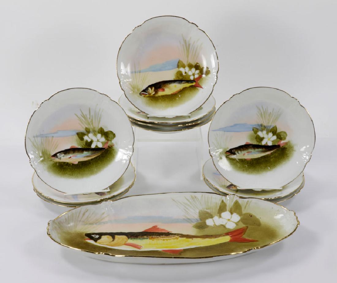 Limoges Fish Plates and Platter: Set of ten Limoges plates and one Limoges platter, porcelain, decorated with fish, 18" diameter (platter), 8 1/2" diameter (plates). Provenance: from a New Haven, Connecticut estate.