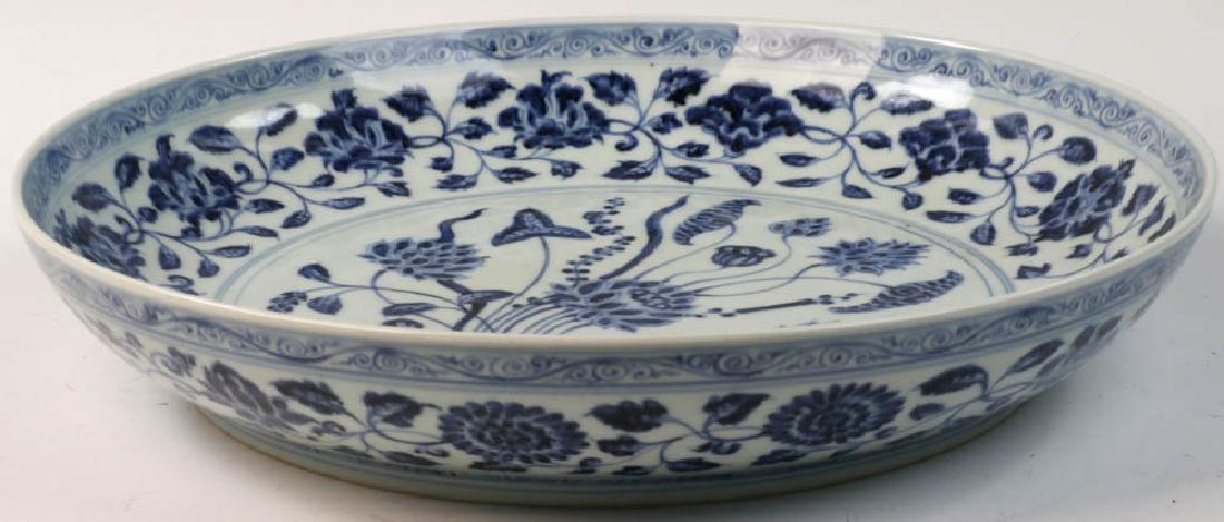 Chinese Blue and White Charger, Ming Dynasty-style: Chinese blue and white porcelain charger, Ming Dynasty-style, round with flower design, 15 1/2" dia.