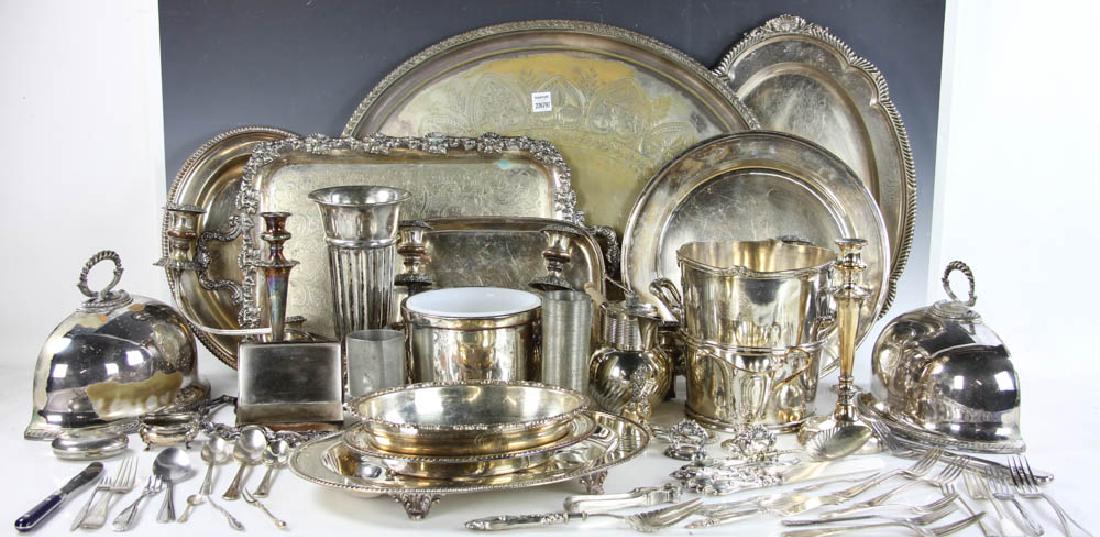 Silverplate Hollowware and Flatware: Group of silverplate hollowware and flatware to include platters, vases, ice bucket, bowls, etc. largest tray 24 1/4" x 19 1/2". Provenance: Estate of Joan Potter, Martha's Vineyard, Massachusetts.