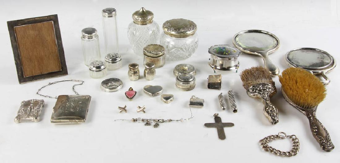 Collection of Sterling Accessories: Collection of sterling accessories to include: card case; cigarette/coin case; dresser jars with sterling covers; pill boxes; mechanical pencil; jewelry; etc.., approximately 20.5 troy oz TW (weighabl