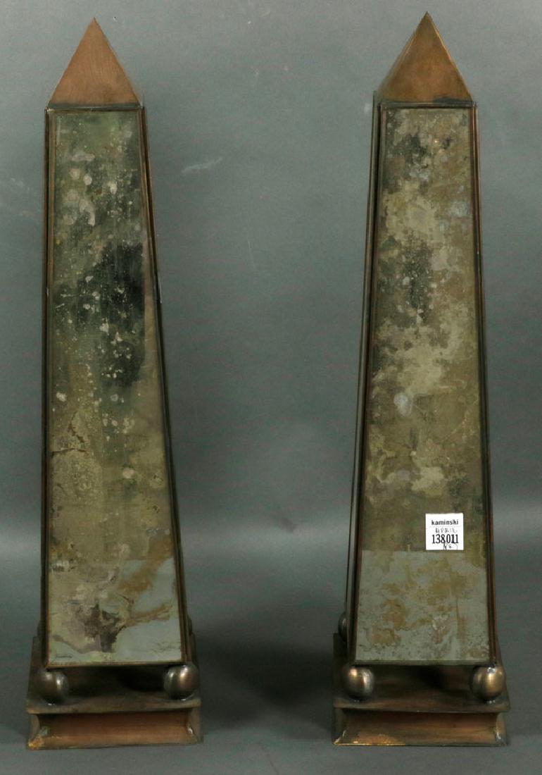 Pair of Glass and Tin Obelisks: Pair of glass and tin obelisks, 20" H x 5" diameter.