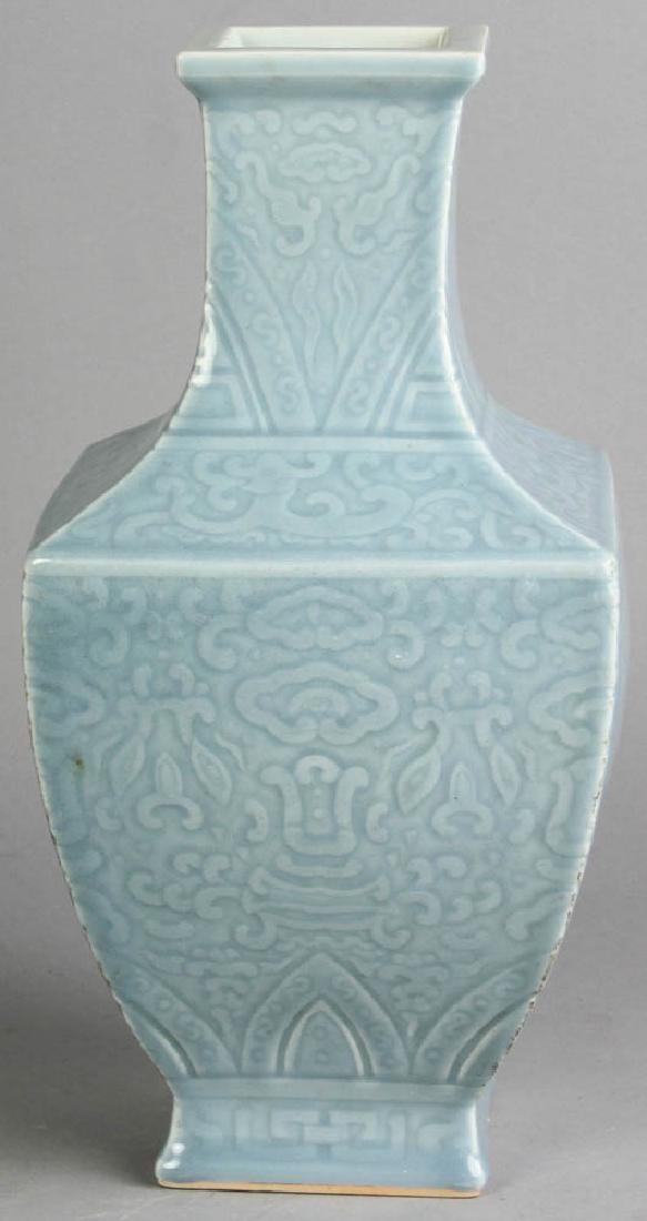 Chinese Square Shaped Blue Glazed Vase: Chinese carved square-shaped blue glazed vase with carved Qing Qianlong mark on base, 13 1/4" H. Provenance: private New England collection.