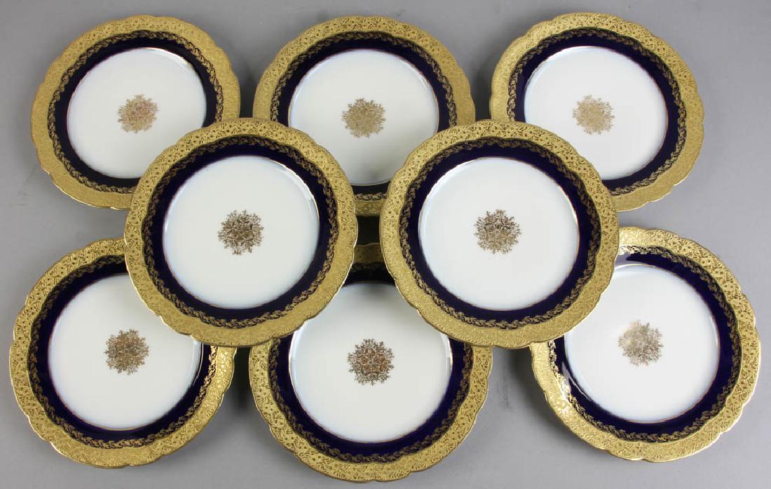 Antique French Limoges Cobalt and Gilt Plates: Antique French Limoges cobalt blue and gilt-rimmed plates, eight (8) in total, 7 1/2" diameter. Provenance: West Palm Beach, Florida collection.