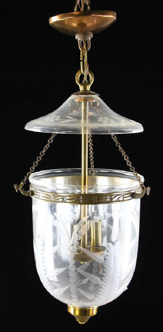 English Style Glass and Brass Light Fixture: English style engraved glass and brass light fixture with smoke bell, wheat design, shade measures 10 1/4" H x 9" diameter. Provenance: West Palm Beach, Florida collection.