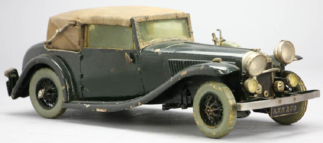 1920s Model Car Alvis Speed 20: 1920s toy model car, Alvis Speed 20 (AXK 279), painted, of brass, handmade, 4" H x 11" L x 4 1/4" W. Provenance: Fort Lauderdale, Florida estate.