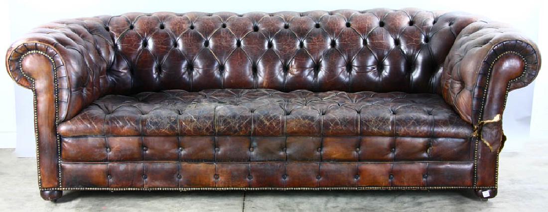 Tufted Leather Sofa: Tufted leather sofa, 30" H x 88" W x approximately 39" D. Provenance: Marblehead, Massachusetts estate.