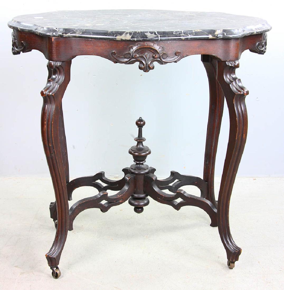 Victorian Black Marble Turtle Top Table: Victorian black marble turtle-top table, 28 3/4" H x 30 1/4" W x 18 3/8" D. Provenance: Massachusetts estate.
