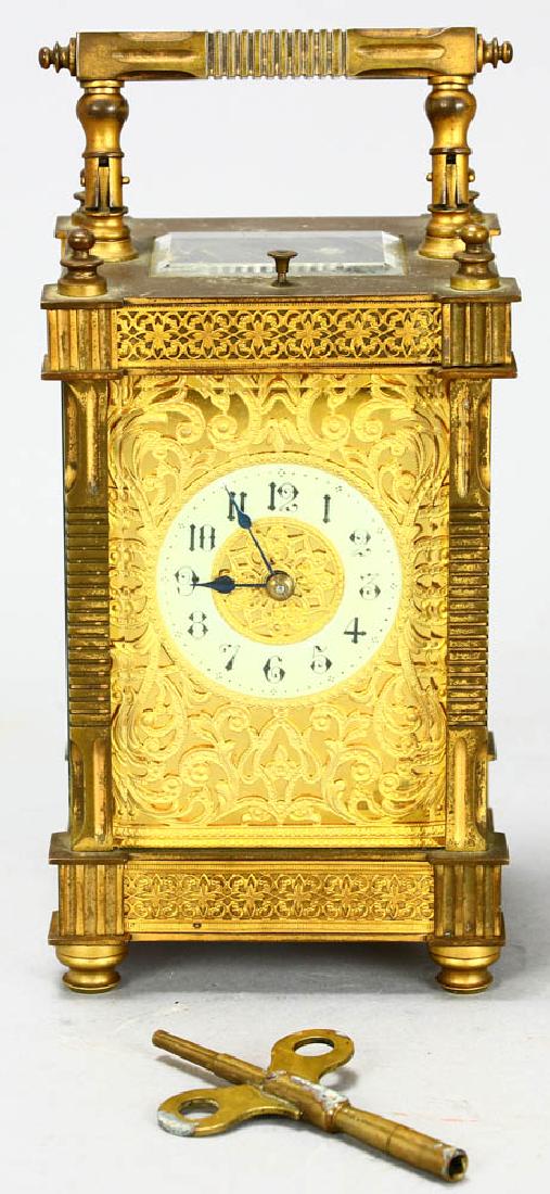 19thC French Gilt Bronze Carriage Clock: 19th century French gilt bronze carriage clock, 7 1/2" H x 3 3/4" W x 3 1/4" D. Provenance: Haverhill St., Reading, Massachusetts estate.