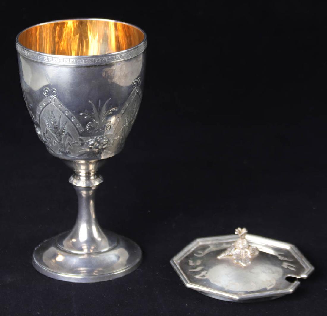Gorham Sterling Chalice, Battuto a Mano Cover: Gorham sterling chalice with vermeil interior, wheat sheaf design with scrolls and florals, and Greek key design on rim, 6 1/2" H x 3 1/2" diameter, with Gorham sterling marks on base. Together with a