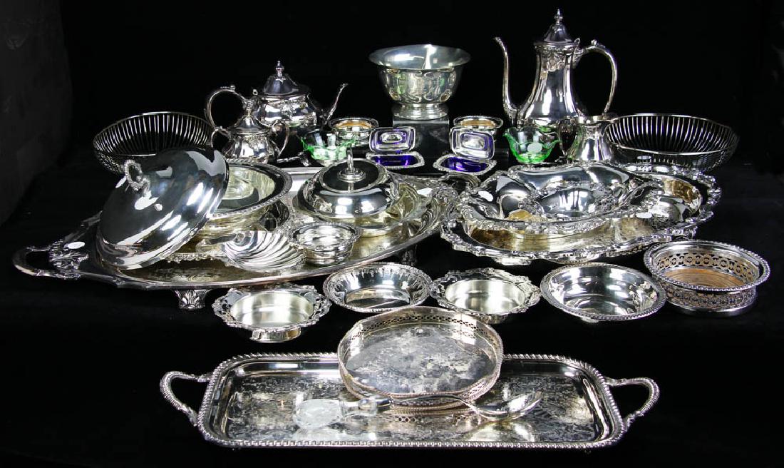 Collection of Silverplate Hollowware: Large collection of antique and 20th century silverplate hollowware to include five-piece tea set, trays, bowls, wine coasters, etc., largest tray measures 29 1/2 " handle to handle) x 18". Provenance