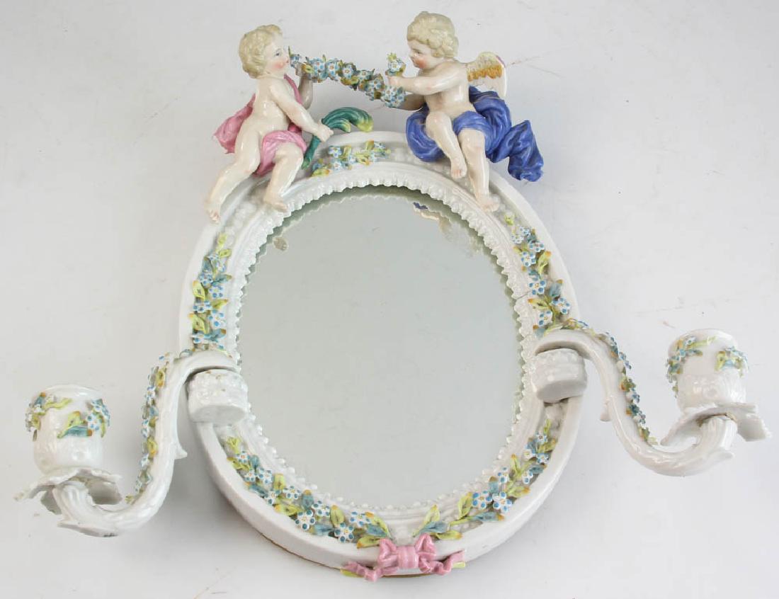 Meissen Style Mirror with Candle Holders: Meissen-style mirror with candle holders, 11" H x 8" W (excluding candle holders). Provenance: Beverly, Massachusetts estate.