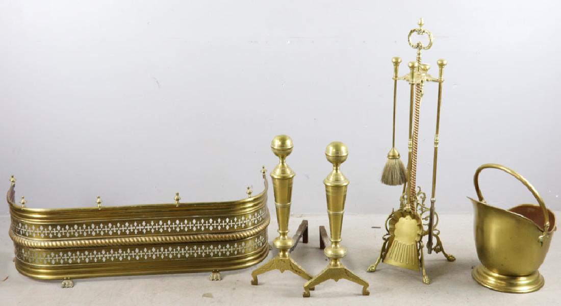 Brass Fireplace Ensemble: Brass fireplace ensemble to include: fender, 37"; tongs, 35"; and andiron bucket.