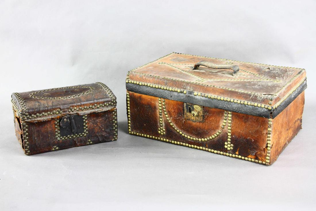 Two Leather Trunks with Brass Nails: Two leather trunks with brass nails, larger 7" x 16" x 10".