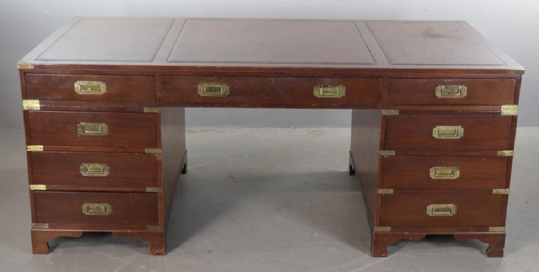 Mahogany Partners Desk: Mahogany partners desk with brass trim and leather top, 30" H x 73" W x 36" D.