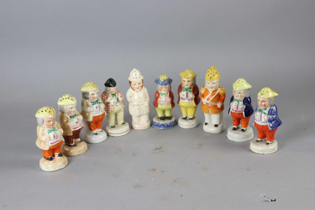 (10) 19thC Staffordshire Toby Motif Pepper Pots: Group of ten (10) 19th century Staffordshire pottery Toby motif pepper pots, 7".