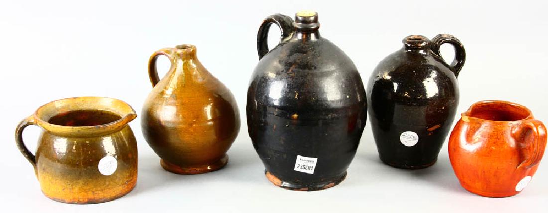 Five Early New England Redware Items: Early New England redware, group of five (5) items.