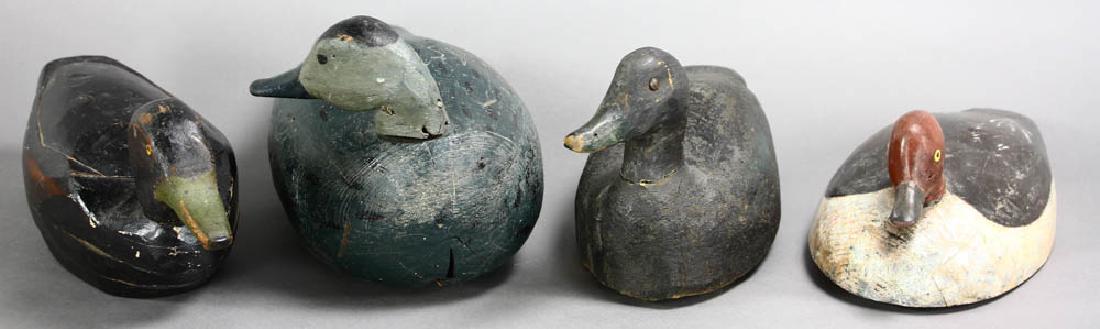 Four Decoys, Capt John Smith, Nova Scotia: Group of four (4) decoys, Captain John Smith, Nova Scotia and others.