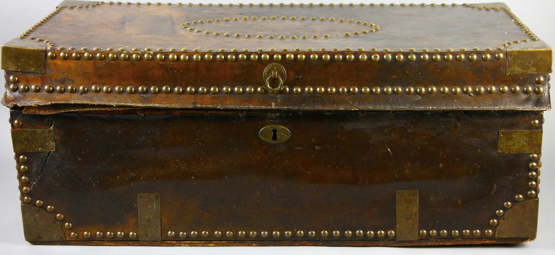 18thC Chinese Camphorwood Chest: 18th century Chinese leather and brass-bound camphorwood chest, 12 1/2" H x 31" W x 15 1/4" D.