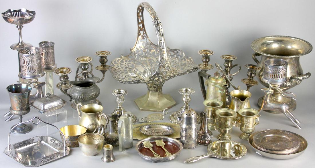Silverplate Decorative Pieces: Large group of silverplate decorative pieces to include: pair of three-arm candelabras, 7 1/2" H; large reticulated basket, approximately 15" H; candlesticks; small trays; muffineer; flask; etc.; toge