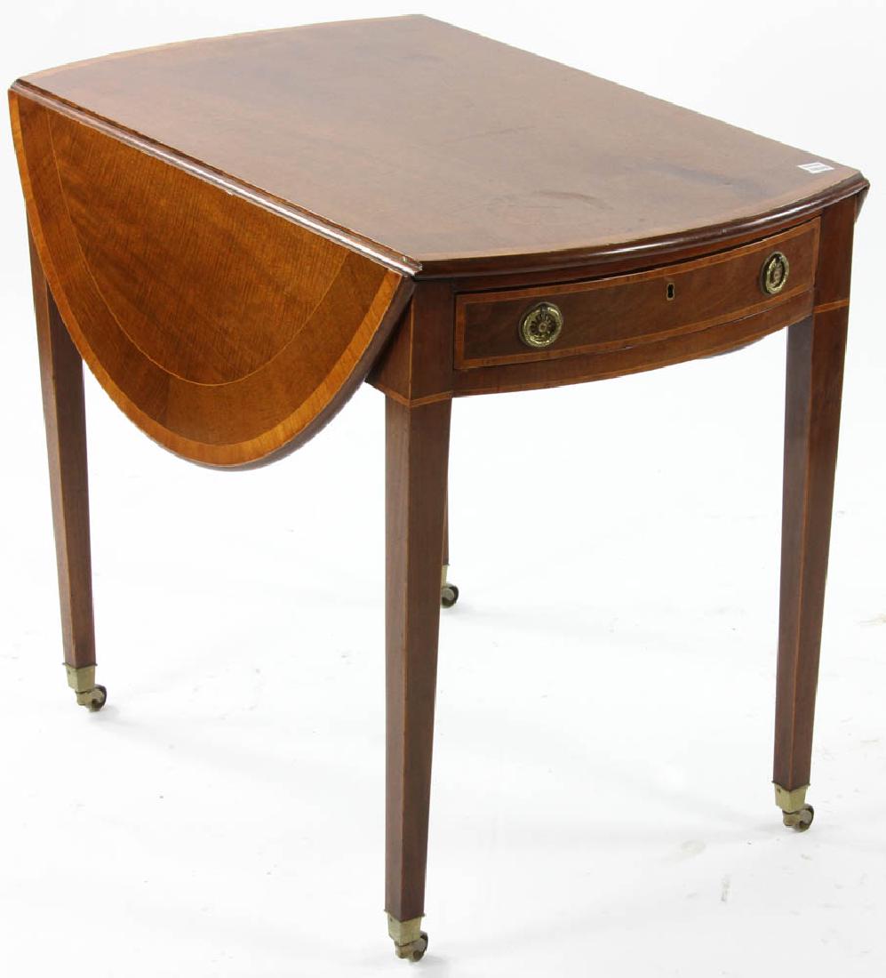George III Period Oval Pembroke Table: George III period oval mahogany and satinwood inlaid pembroke table, circa 1790, 28" H x 40 1/2" W x 32" D.