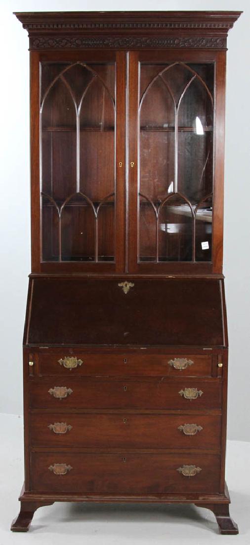 C1950 Chippendale-style Mahogany Secretary: Circa 1950 Chippendale-style mahogany secretary bookcase having slant-lid desk with leather insert, 77" H x 30" W x 17" D, labeled on back "Smith & Watson, Antique English Furniture, New York.
