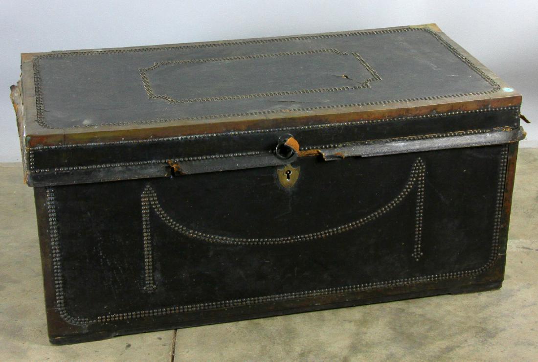 Early 19th C Chinese Camphor Wood Trunk: Early 19th century Chinese camphor wood chest brass-bound and black leather, missing handles, 20" H x 41" W x 21" D.