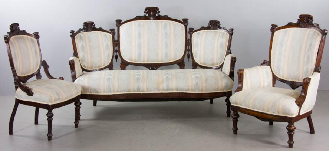 3-pc Suite of Victorian Walnut Furniture: Three-piece suite of Victorian carved walnut furniture, to include sofa, armchair, and side chair. Sofa 42 1/2"h. x 65 1/2"w. x approximately 27"d.