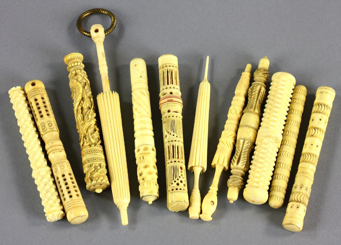 Collection of 19th C Carved Bone Needle Cases: Collection of 19th century finely carved bone needle cases with threaded closures to include three figural parasol-form with stanhopes depicting castles and cathedrals, twelve (12) total, tallest 5 3/