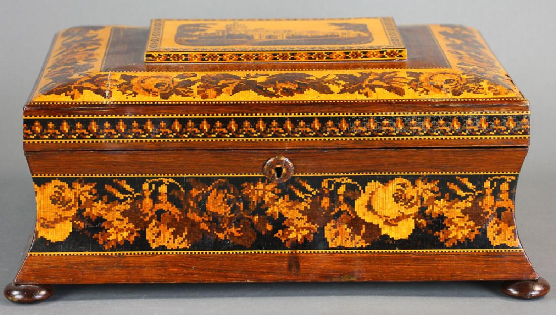 Tunbridge Ware Sewing Box Depicting Eridge Castle: Circa 1875 Tunbridge ware rosewood sewing box with beveled lid having raised central panel depicting Eridge Castle, surrounded by geometric borders on top and side, band of floral border of roses and 