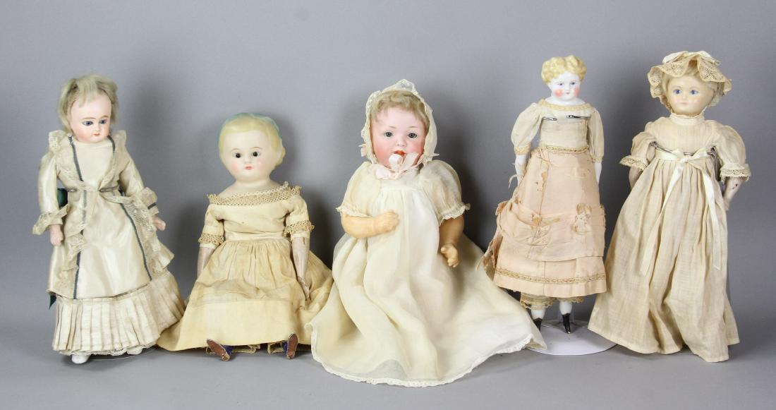Group of Five Antique Dolls: Group of five (5) antique dolls to include: wax head with composition body, wooden arms and legs, 14"; wax over composition, glass eyes, cloth torso, composition arms and legs, 13"; Bahr and Proschild