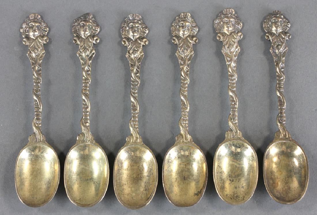 Set of Six English Silver Vermeil Spoons: Set of six (6) English vermeil spoons with portrait medallion, engraved crest on back, hallmarked for Daniel and John Wellby, London, 1882-1883, 4 1/4" L. Provenance: Boca Raton, Florida collection. P