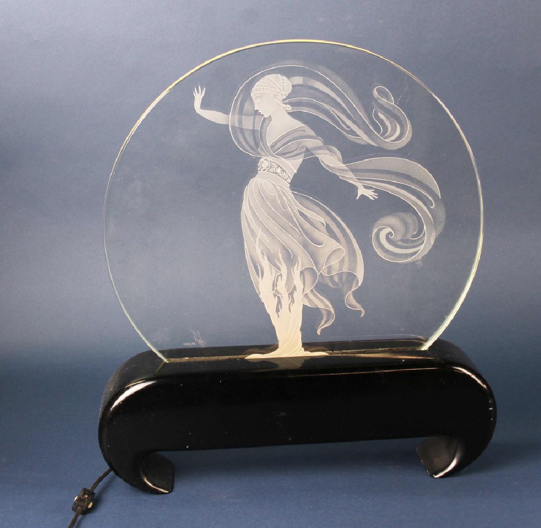 Signed and Numbered Erte Glass Luminaire: Erte luminaire, signed and numbered 02/250 in glass, 87/25, 21" x 18 1/2", on stand. Provenance: Palm beach, Florida estate.